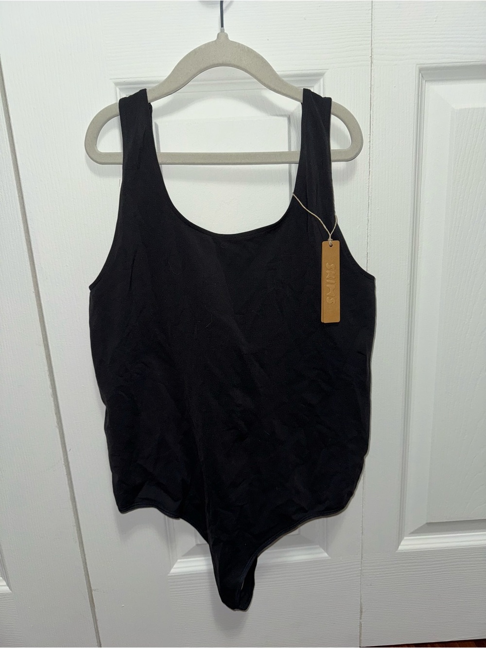 Skims Bodysuit. NWT - never worn.